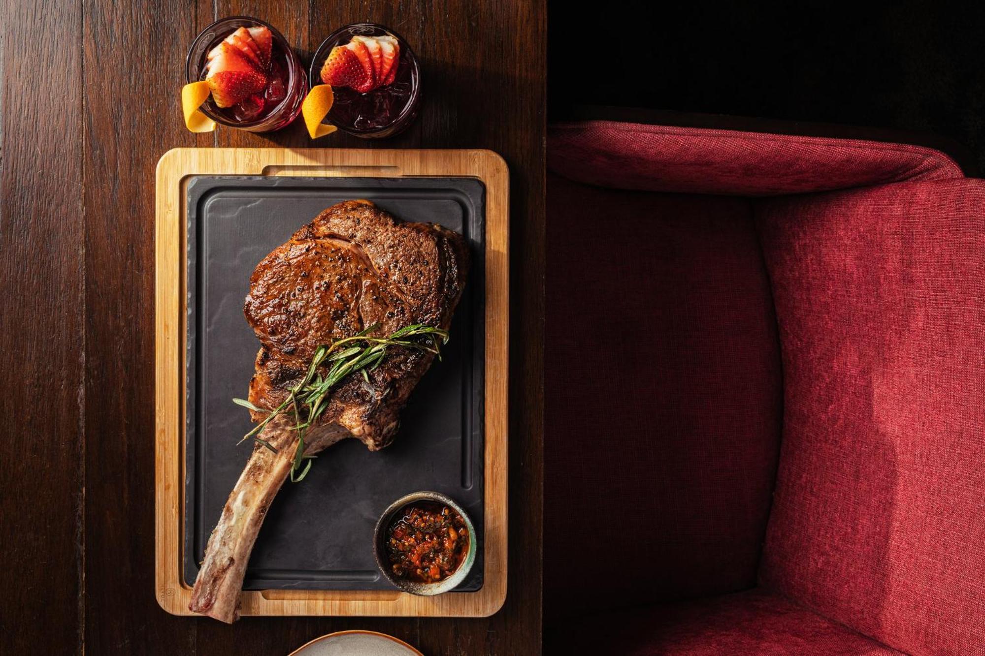 Voco Orchard Singapore By Ihg Экстерьер фото A tomahawk steak