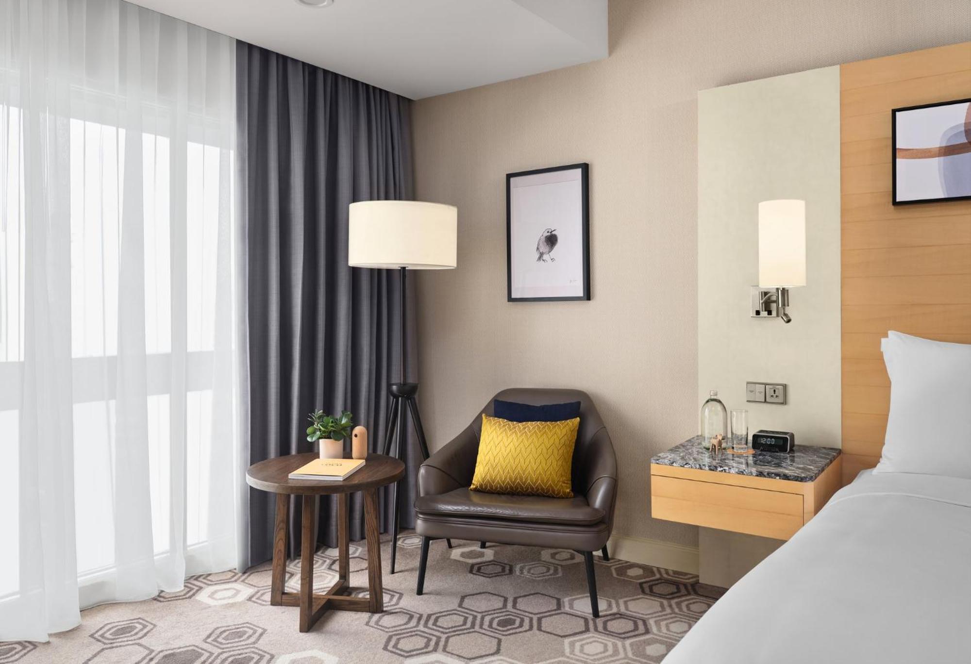 Voco Orchard Singapore By Ihg Экстерьер фото A room at the hotel