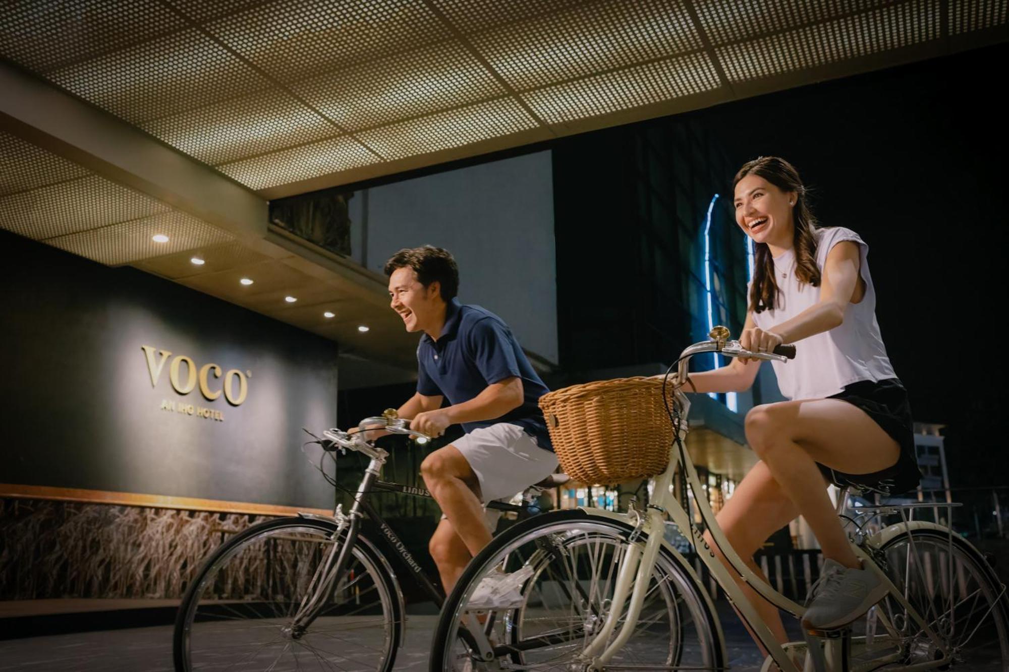 Voco Orchard Singapore By Ihg Экстерьер фото Bicycle sharing station at Voco Central