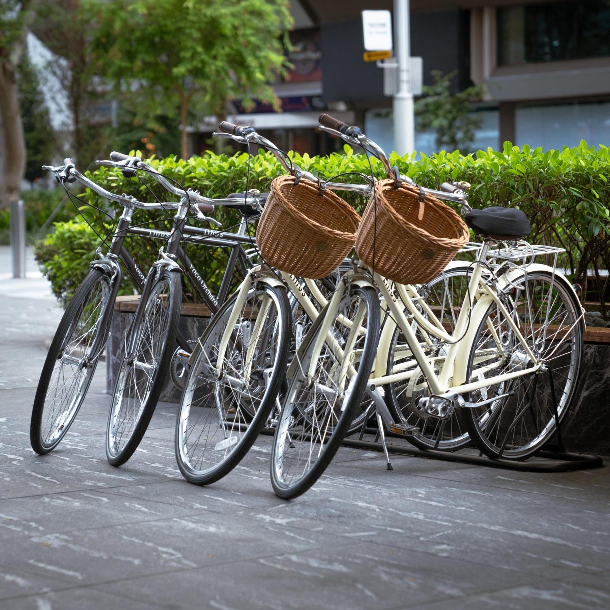 Voco Orchard Singapore By Ihg Экстерьер фото Bicycles parked in a row